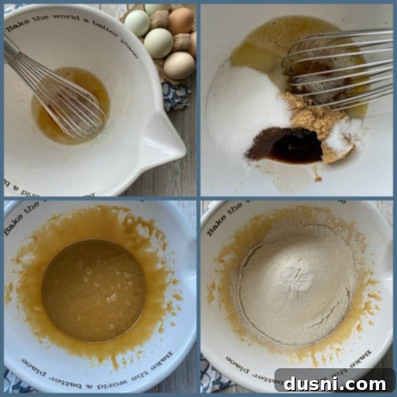 Various baking ingredients for cookies laid out on a marble counter, including flour, sugars, and eggs.