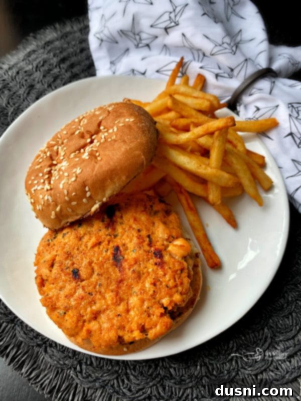 Blackened Salmon Patties and Zesty BLT Slaw 6 Grilled blackened salmon burger on a bun with BLT slaw