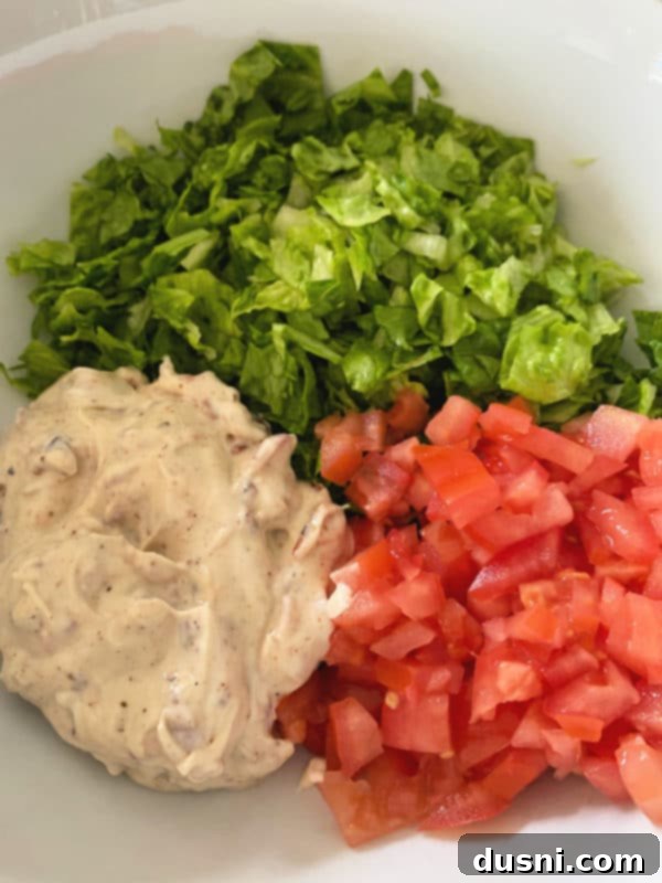 Blackened Salmon Patties and Zesty BLT Slaw 8 BLT slaw mixture of lettuce, tomato, and baconnaise