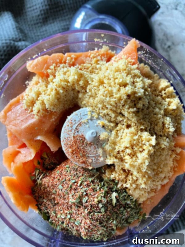 Blackened Salmon Patties and Zesty BLT Slaw 9 Salmon chunks, breadcrumbs, and seasoning in a mini food processor