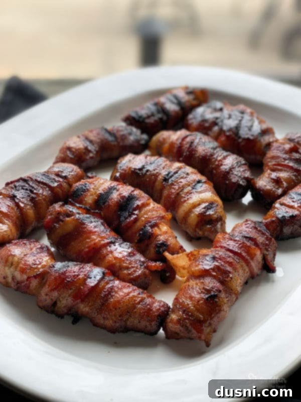 Sweet & Spicy Bacon Wrapped Pork Ribs on a platter