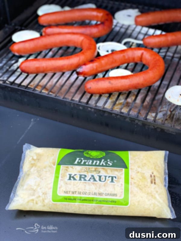 Grilled Kielbasa and Kraut 4 Grilled Polish sausage on the grill grates with grill marks