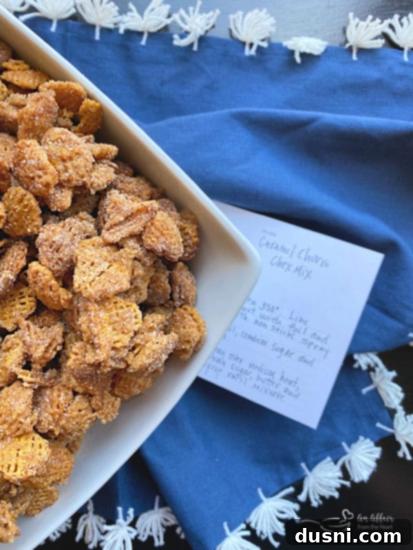 An overhead shot of Caramel Churro Chex Mix in a festive bowl