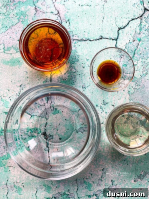 Close-up view of all the ingredients for making peanut brittle, neatly arranged on a countertop