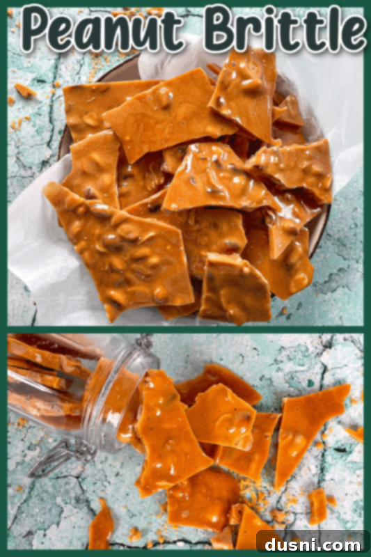 A close-up of a pile of delicious peanut brittle shards, glistening with caramelized sugar and studded with peanuts
