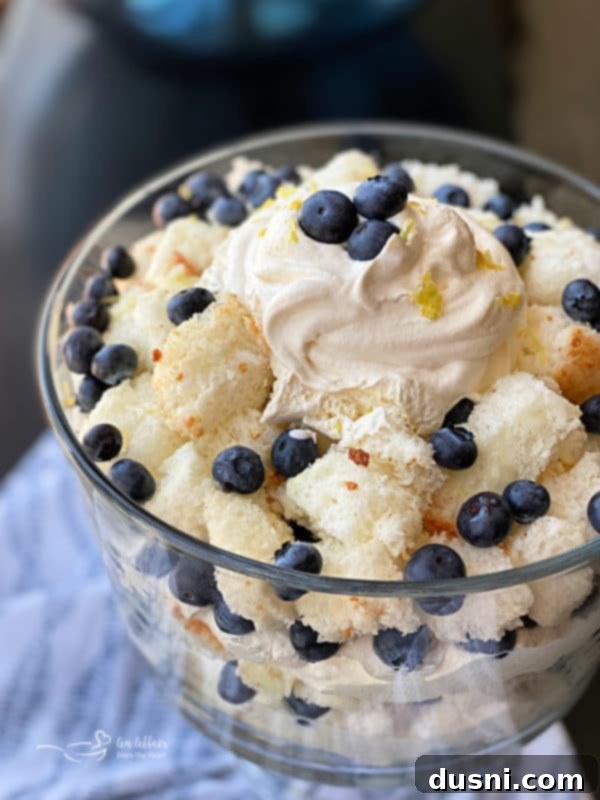 Lemon Blueberry Trifle with layers of cake, berries, and cream