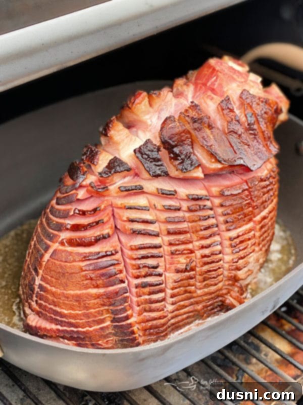 Glazed Smoked Ham fresh off the Traeger pellet grill, showcasing its golden brown glaze
