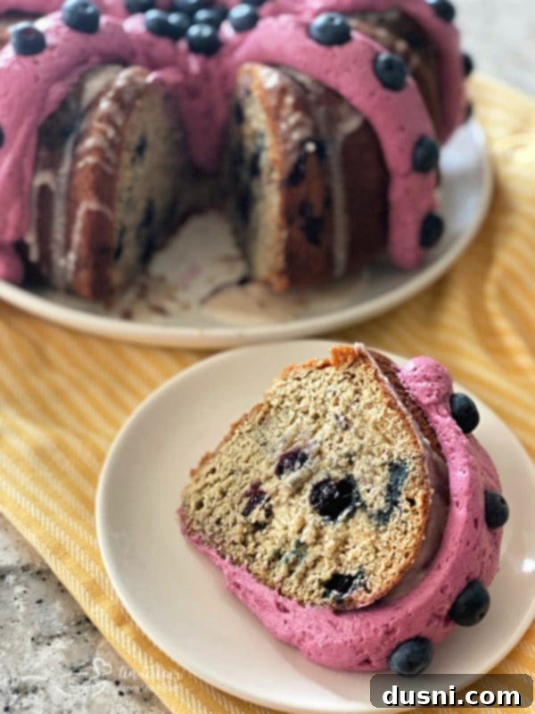Blueberry Banana Bundt Cake slice on a plate