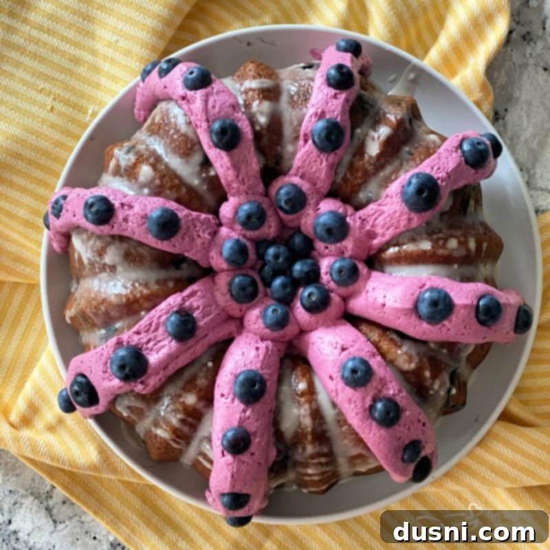 Close up of Blueberry Banana Bundt Cake with frosting