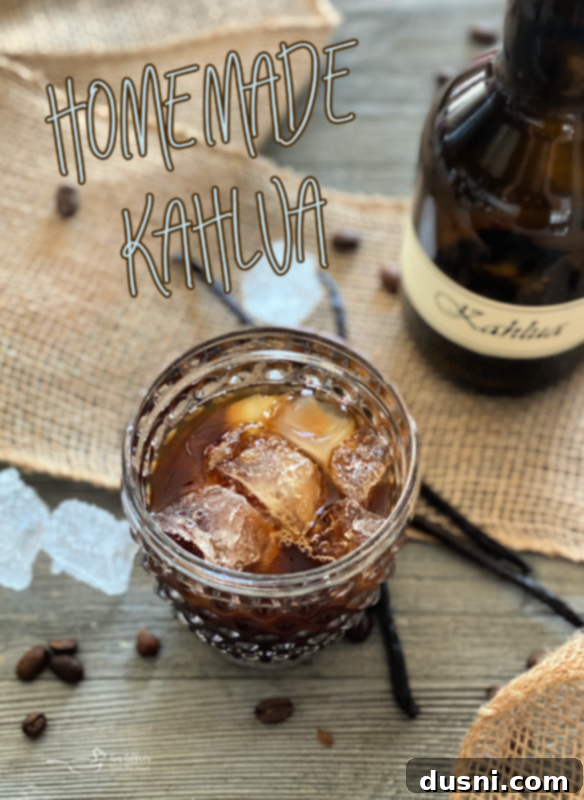 Three elegant bottles of homemade Kahlua, showcasing the rich, dark coffee liqueur, ready for gifting or enjoyment.