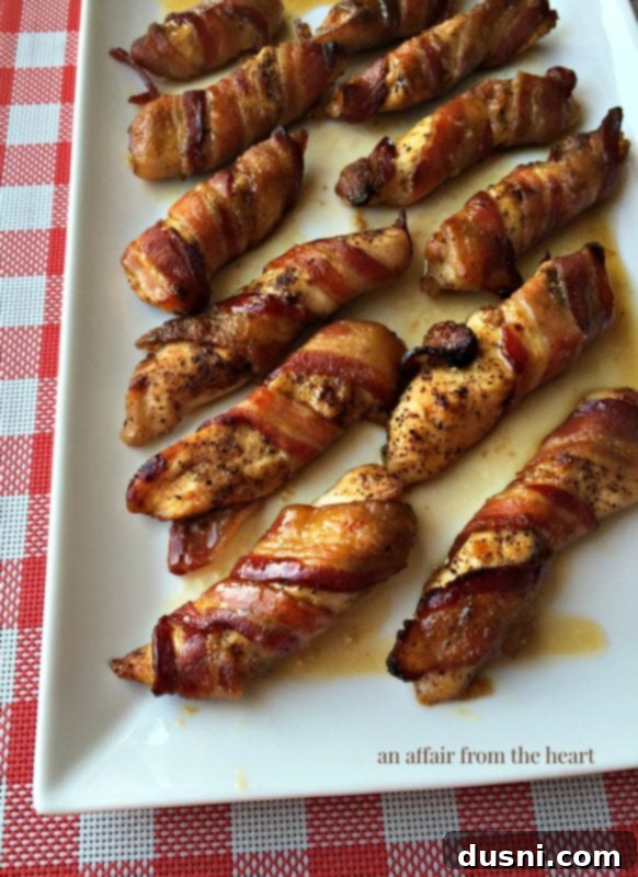 Bacon's Embrace: Recipes for Wrapped Perfection 10 Sweet & Spicy Bacon Chicken - a flavorful chicken dish wrapped in crispy bacon.