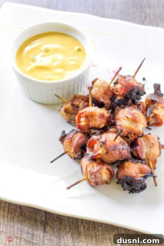 Bacon's Embrace: Recipes for Wrapped Perfection 6 Bacon-wrapped hot dog bites, a perfect party snack.
