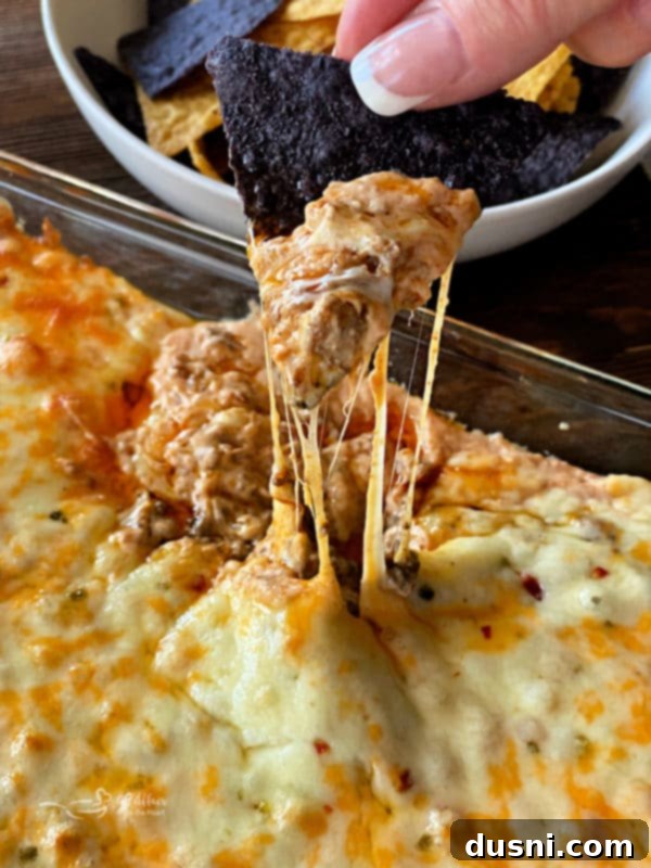 A dish of Dorothy's Hot Taco Dip freshly baked