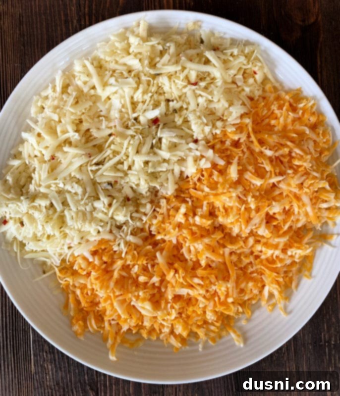 Dorothy's Hot Taco Dip garnished with cilantro and served with blue tortilla chips