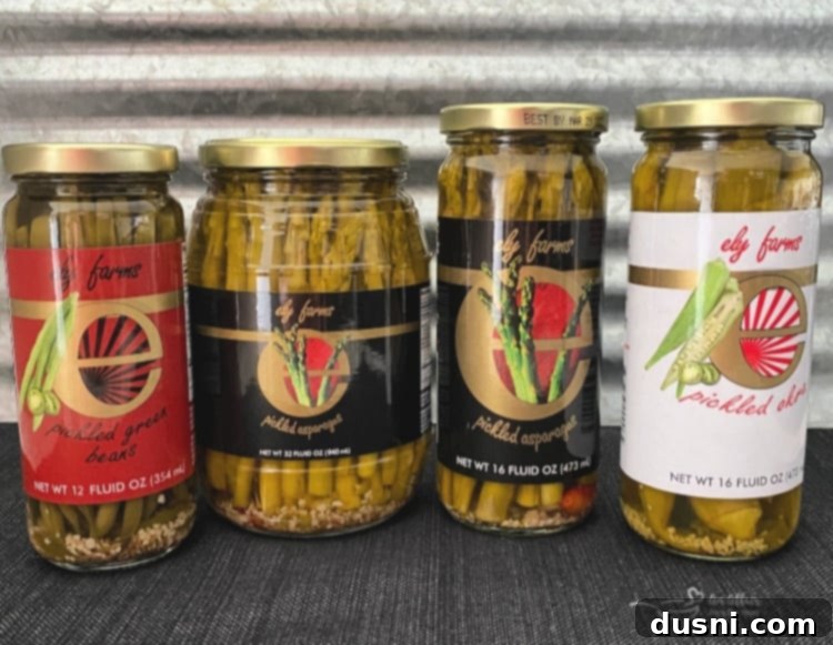 Zesty Okra Delight 13 Ely Farms Pickled Veggies - a collection of jars