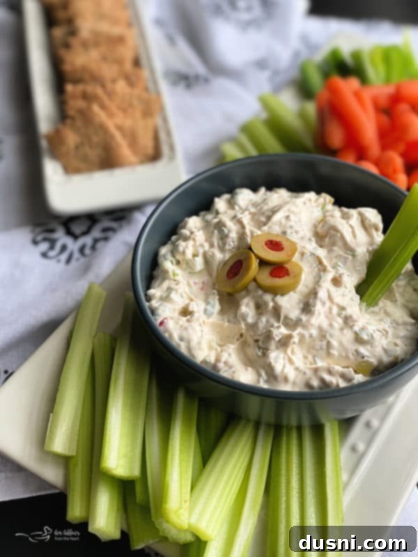A close-up of the olive dip in a bowl, showing texture and ingredients