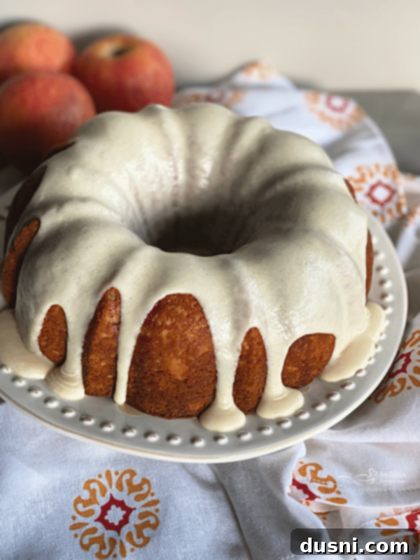 Caramel Apple Tea Cake with a drizzle of vanilla glaze.