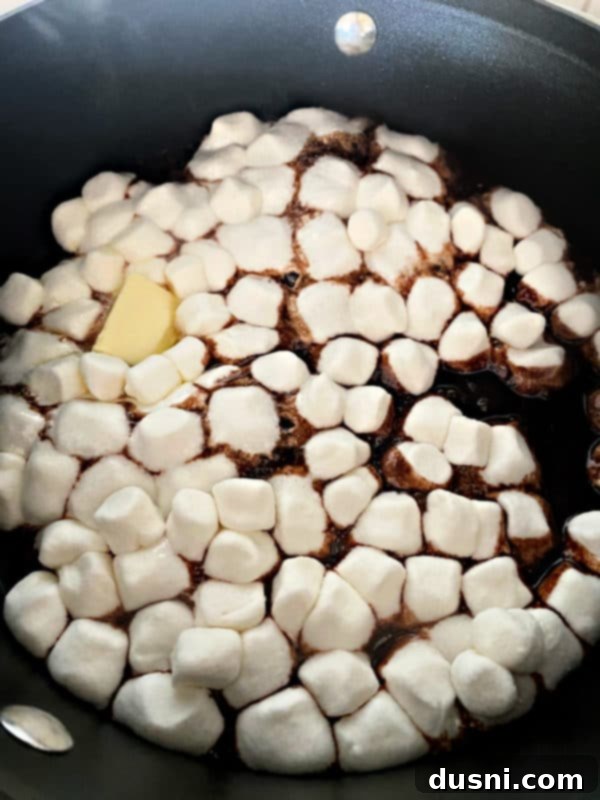 Melted marshmallow, butter, and chocolate syrup mixture