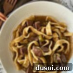 Mom's Beef & Noodles in a white bowl, ready to be served and enjoyed.