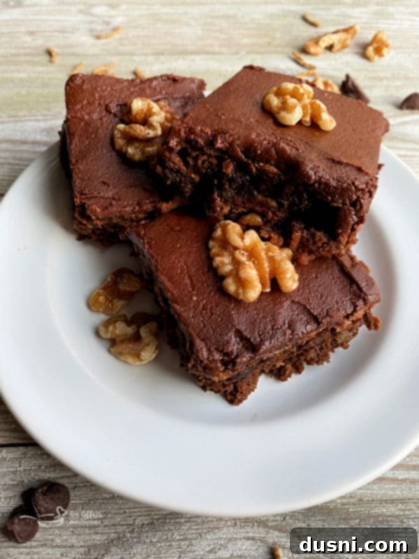 Ultimate Chocolate Banana Bars 3 Chocolate Banana Bars with rich frosting and walnuts