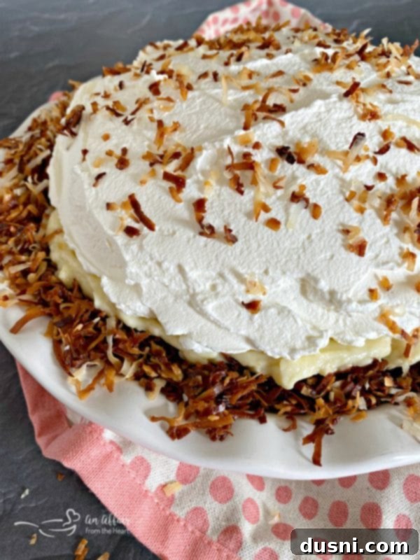 Close-up of finished Coconut Banana Cream Pie with layers