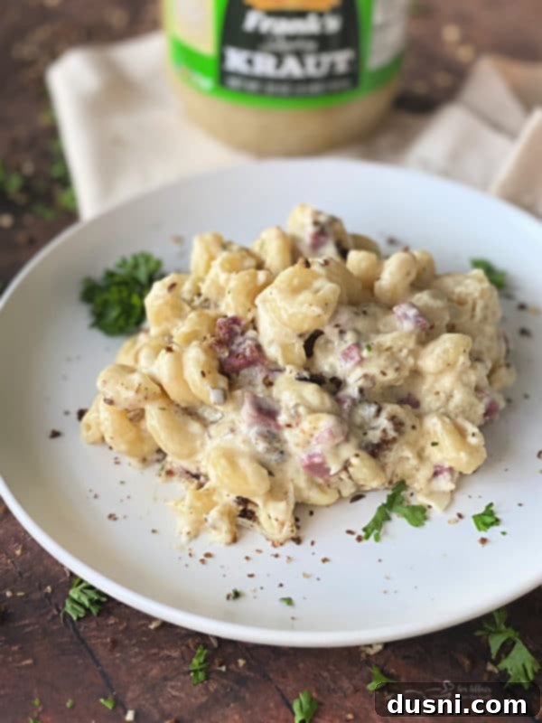 Another perspective of Reuben Mac 'n Cheese in a serving dish, highlighting the texture and topping.