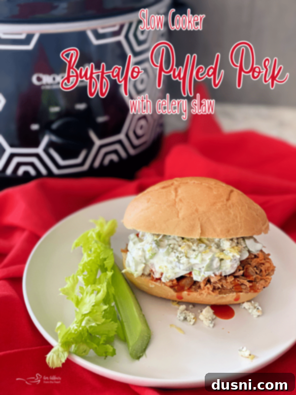Spicy Slow Cooker Buffalo Pulled Pork with Cooling Celery Slaw 19 Buffalo Pulled Pork Sandwich close-up