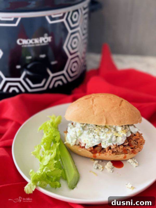 Spicy Slow Cooker Buffalo Pulled Pork with Cooling Celery Slaw 4 Cooked Buffalo Pulled Pork in Slow Cooker