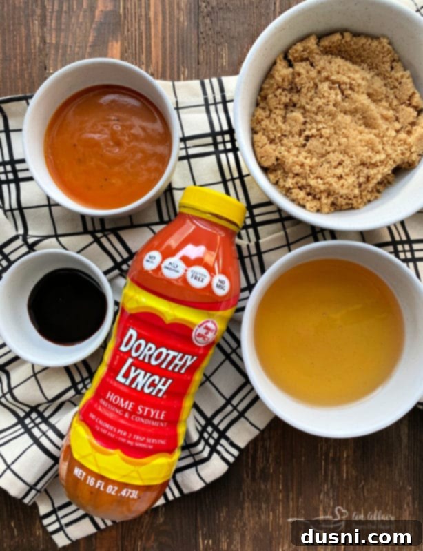 Perfectly Glazed Slow Cooker Ham 5 Ingredients for Dorothy's Ham Glaze laid out, including Dorothy Lynch dressing, honey, brown sugar, and molasses.