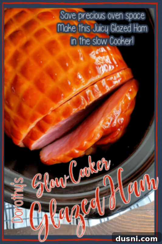 Perfectly Glazed Slow Cooker Ham 8 Cooked slow cooker glazed ham, sliced and ready to be served, highlighting its moist interior.
