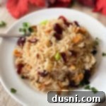 Rice Pilaf with Cranberries and Almonds in a white bowl
