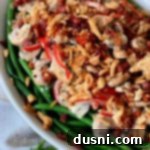 From Scratch Green Bean Casserole close up in white casserole dish