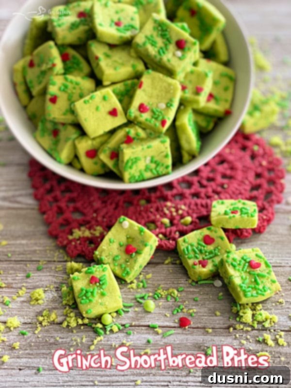 A festive display of Grinch Shortbread Bites