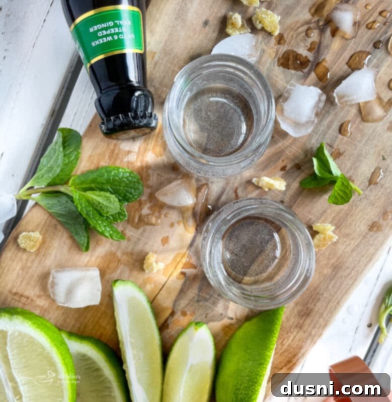 The Ginger Kick from Moscow 4 Ingredients for a Moscow Mule: lime, vodka, ginger beer, and ice in a copper mug.