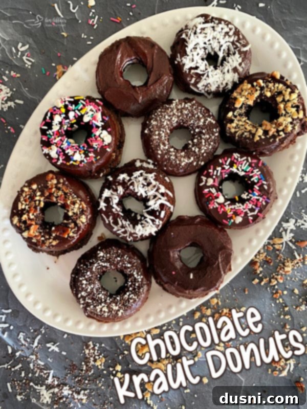 Baked chocolate kraut donuts on a cooling rack, ready to be served.