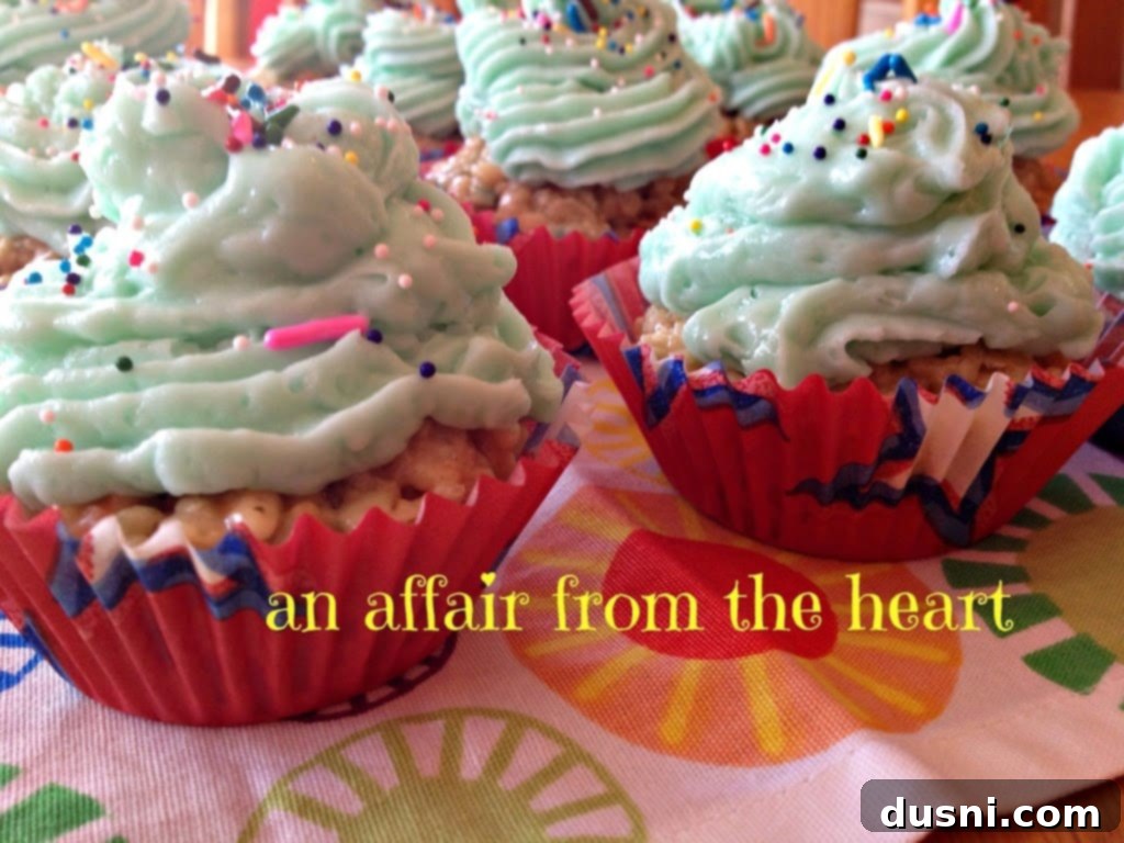 Delicious Cake Batter Rice Krispie Cupcakes with Marshmallow Buttercream and colorful sprinkles