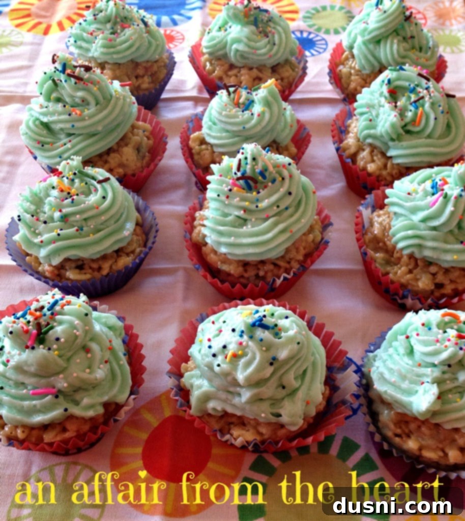 Three Cake Batter Rice Krispie Cupcakes with sprinkles, ready to be enjoyed