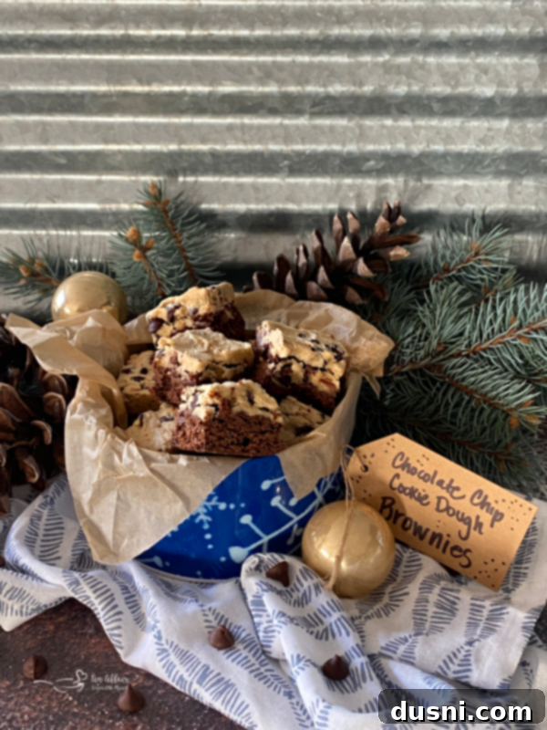 Cookie Dough Brownie Dream 17 Chocolate Chip Cookie Dough Brownies carefully arranged in a festive tin for a virtual cookie exchange.