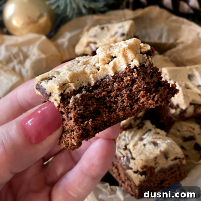 Cookie Dough Brownie Dream 3 A tray of freshly made Chocolate Chip Cookie Dough Brownies, cut into squares, ready to be served.