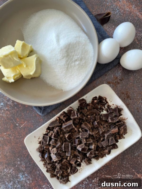 Cookie Dough Brownie Dream 8 High-quality dark chocolate chunks in a bowl, ready for melting.