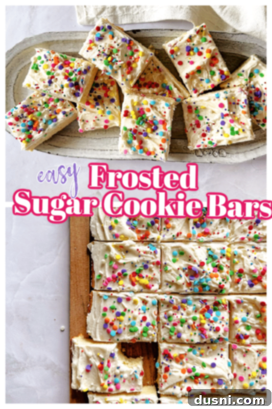 A large tray of freshly frosted and decorated Frosted Sugar Cookie Bars.