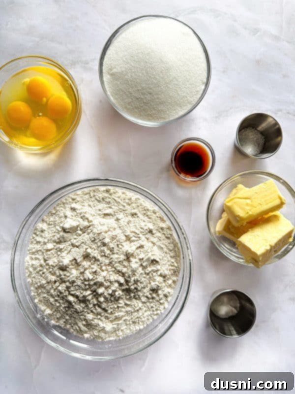 Individual Frosted Sugar Cookie Bars on a white plate, showcasing their soft texture.