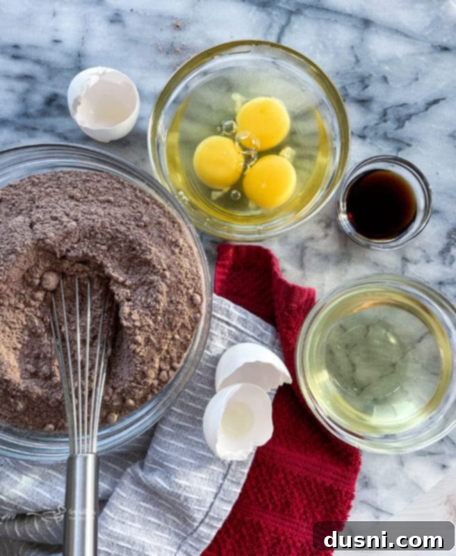 Ingredients for chocolate whoopie pie cakes including Devil's food cake mix, eggs, vegetable oil, and vanilla extract