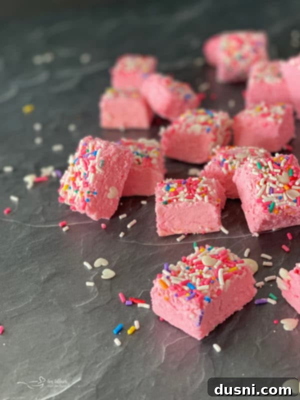 Velvet White Chocolate Cheesecake Fudge 2 Close-up of pink Valentine's Day fudge with sprinkles