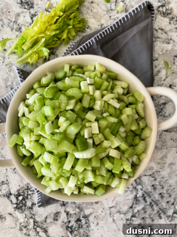 Close up of Cream of celery soup in a blue bowl