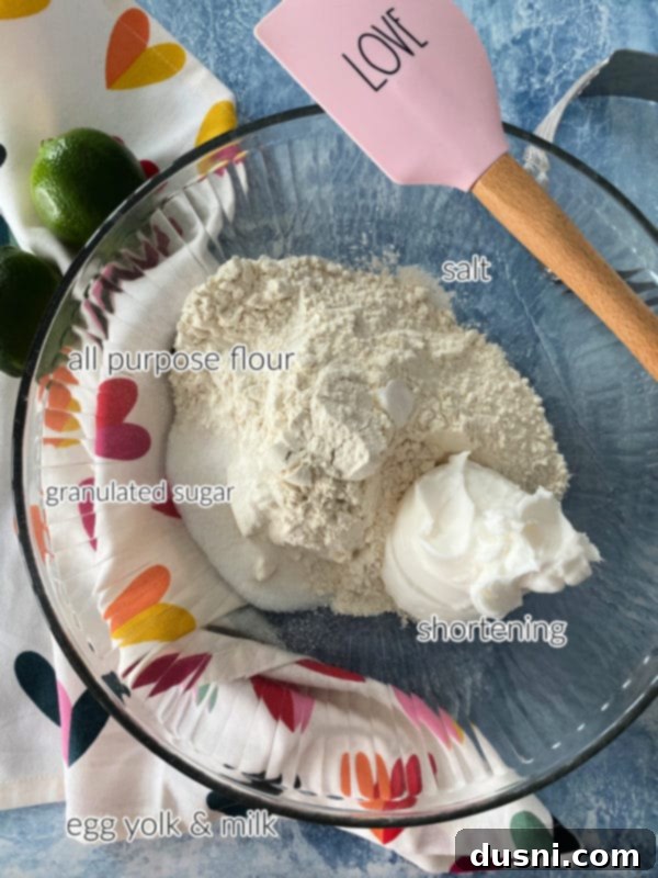 Zesty Key Lime Sheet Pie 7 Ingredients for Key Lime Slab Pie crust: flour, sugar, salt, shortening, egg yolk, and milk.