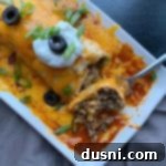 Overhead of Cop cat Taco Bell Enchirito fork bite