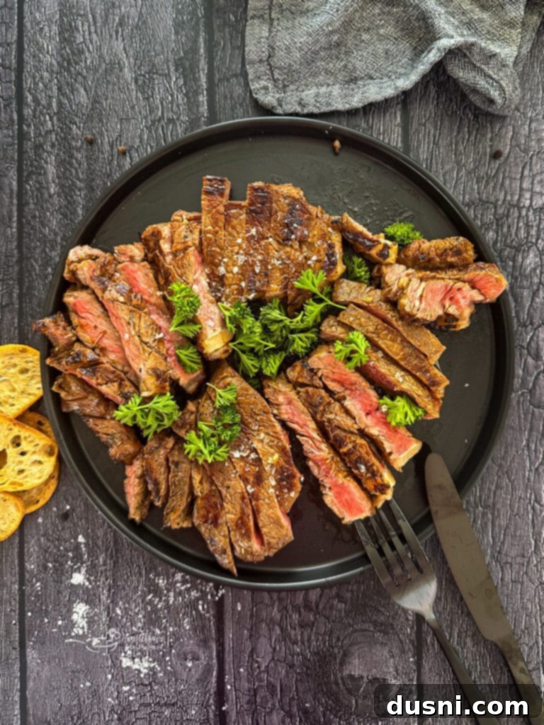 Jack Daniel's and Cola Glazed Steaks 3 Close-up of a juicy Jack and Coke Steak on the grill.