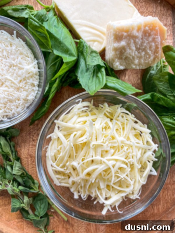 Pepperoni Pizza Grilled Cheese Melt 6 Close-up of freshly grated Mozzarella and Parmesan cheeses.