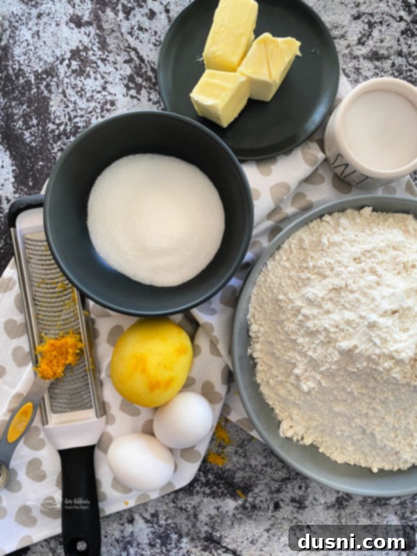 Flour, lemon, eggs, sugar, and butter for lemon sweet rolls
